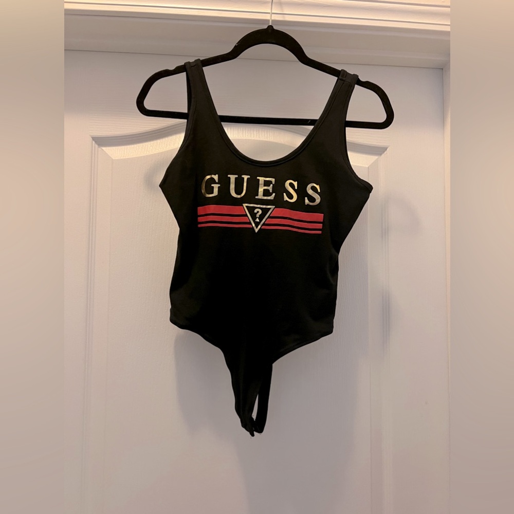 Guess bodysuit new never worn.